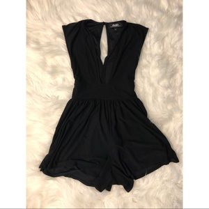 Lulu’s Peplum Low Cut Romper (Black)
